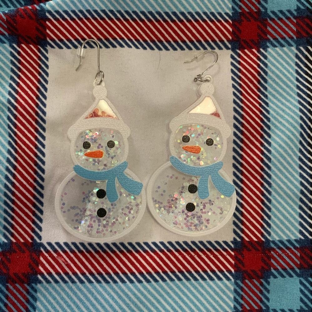 Snowman dangle earrings with loose glitter inside